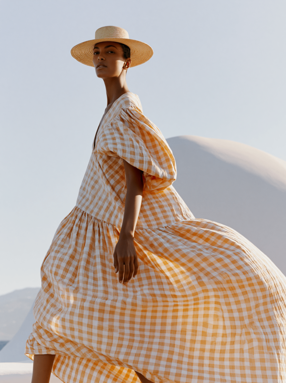 Zanzibar fashion portrait in a checked summer dress