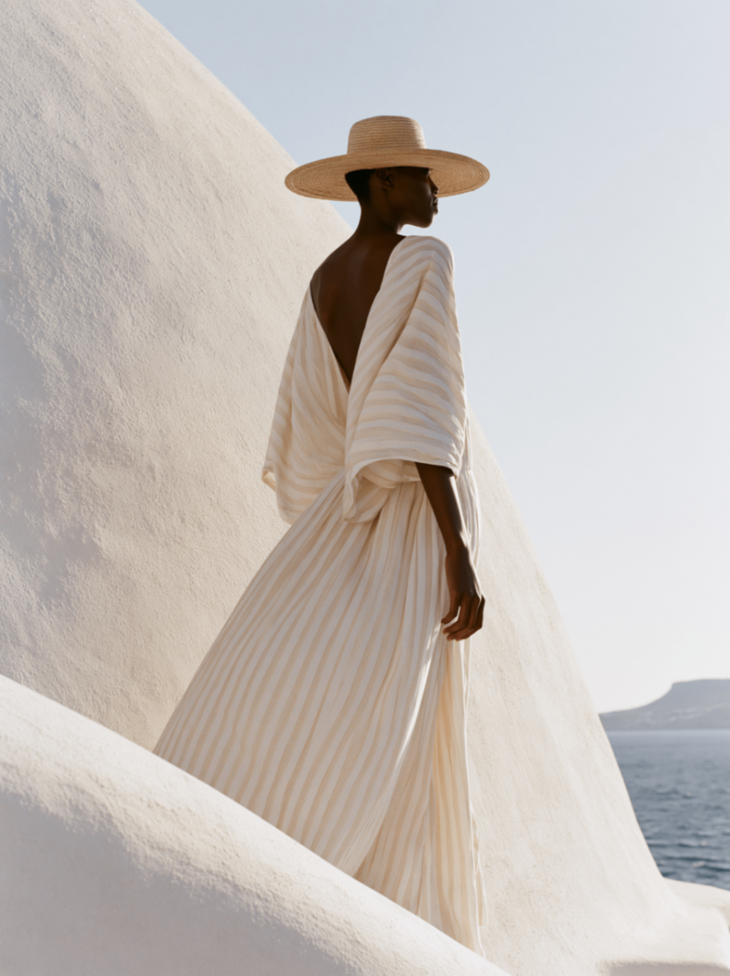Zanzibar fashion portrait among white coastal architecture