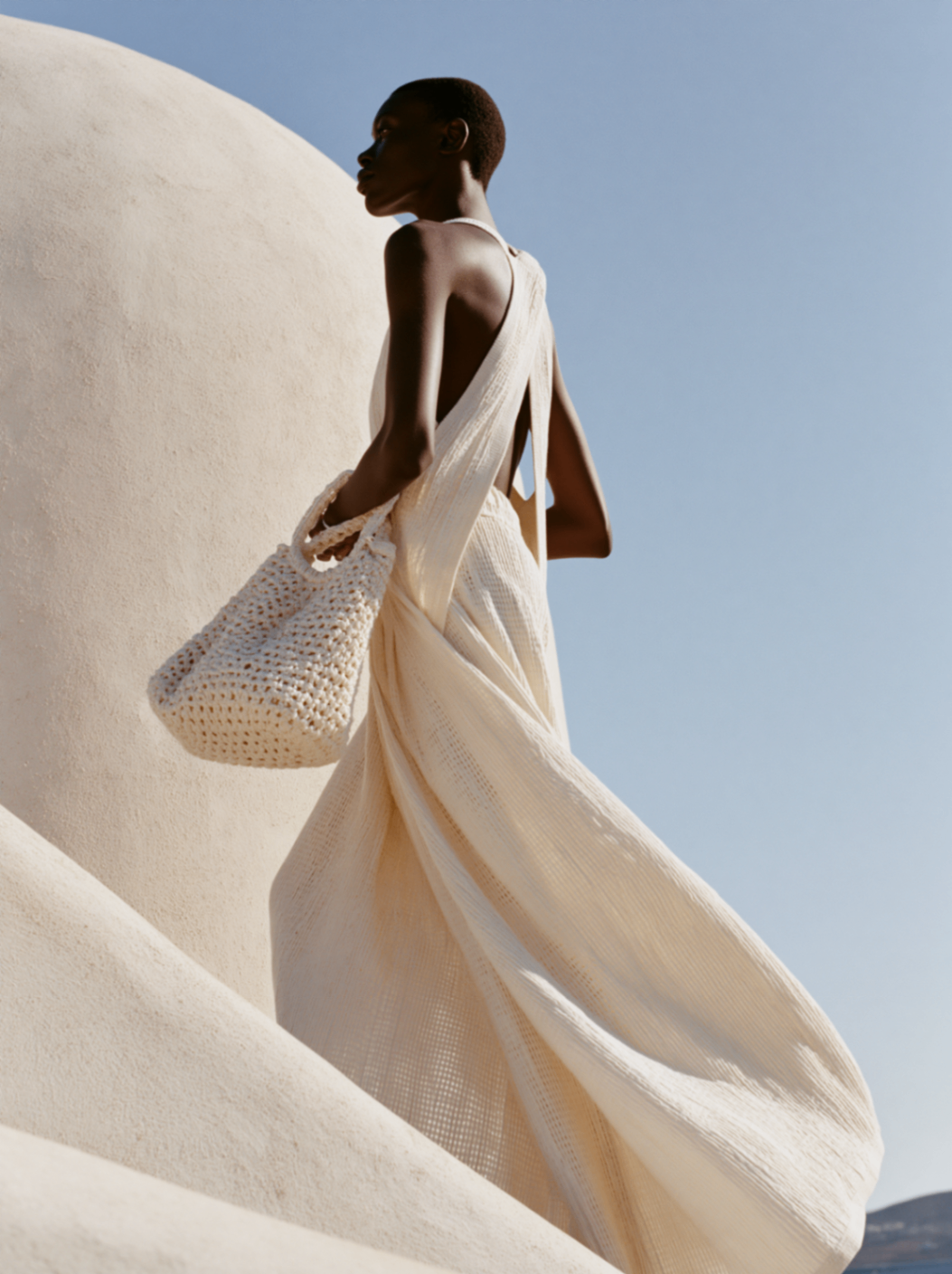 Zanzibar fashion portrait against sculpted white walls